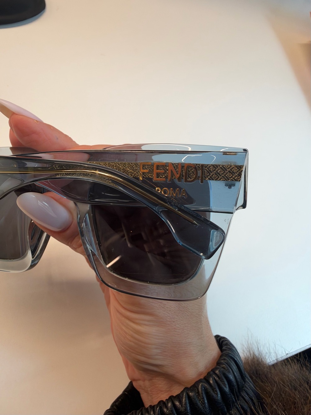 Fendi Translucent Gray Shield Sunglasses with Gold Logo